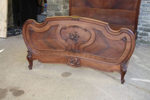 fig 2. Rosewood Louis XV style French king size bed with carved detail