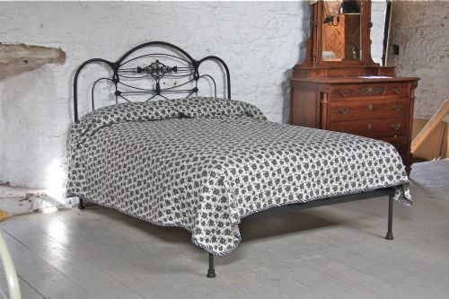 Striking and Individual Early Black All Iron No Foot End Kingsize Bed