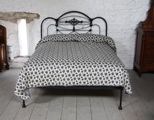 fig 2. Striking and individual Early black all iron no foot end kingsize bed