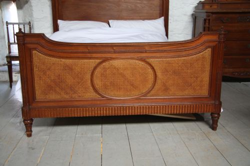 fig 1. Stunning unusual king size French solid mahogany bed with cane detail in foot end