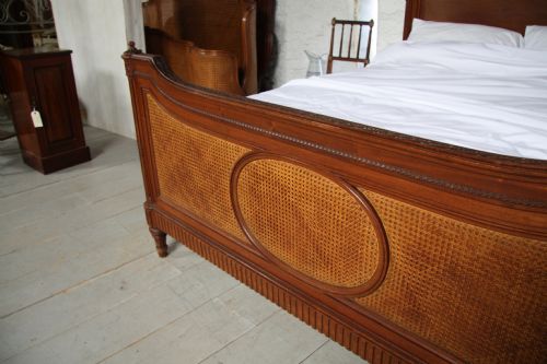 fig 2. Stunning unusual king size French solid mahogany bed with cane detail in foot end