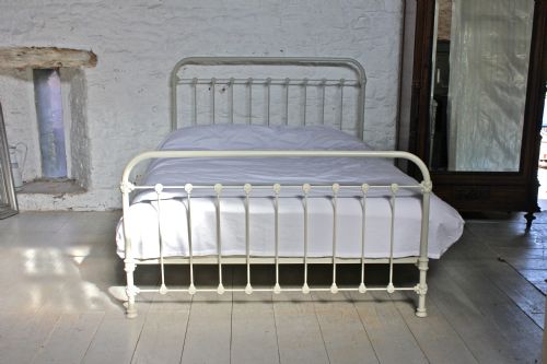 fig 1. Simple French all iron king size bed in aged old white