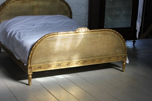 fig 1. Good quality gilded carved and caned French king size bed