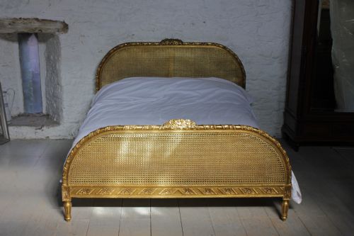 fig 2. Good quality gilded carved and caned French king size bed
