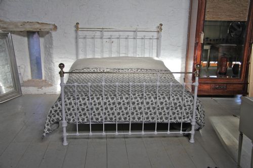 fig 1. Pretty classic Victorian king size brass and iron bedstead