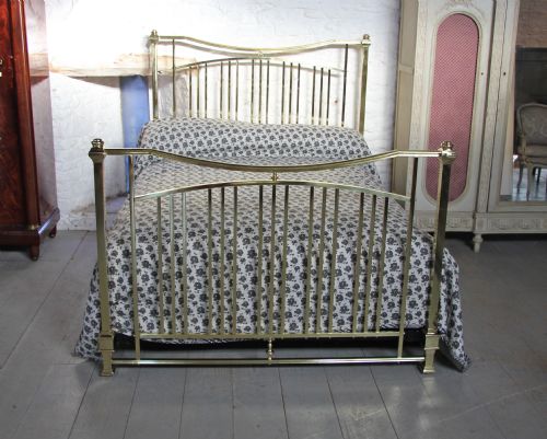 fig 1. Unusual polished and lacquered solid brass king size French bed