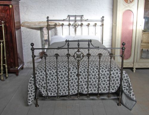 fig 1. Burnished iron and aged brass king size Victorian bedstead
