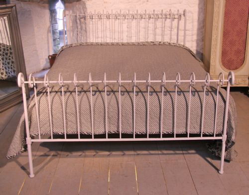 fig 1. Attractive unusual simple forged iron king size bed with curl detail.