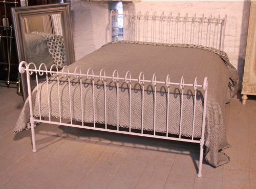 fig 2. Attractive unusual simple forged iron king size bed with curl detail.