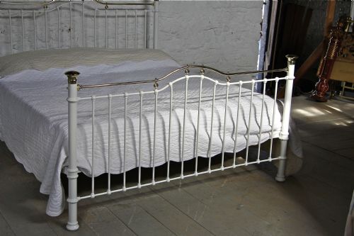 fig 1. Six foot wide classic Victorian white and brass bed