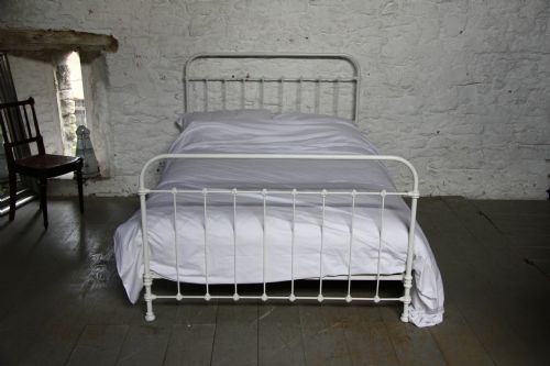 fig 1. Simple all iron French double bed in heritage white