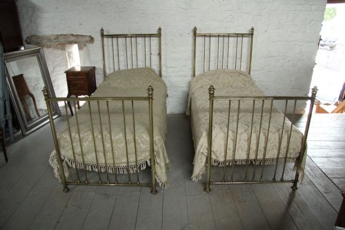 fig 1. Pair of single Edwardian all brass beds