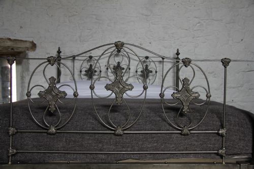 fig 2. Truly stunning burnished iron king size bed with taper tube posts
