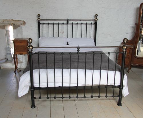 fig 1. Classic black and aged brass Victorian king size bed