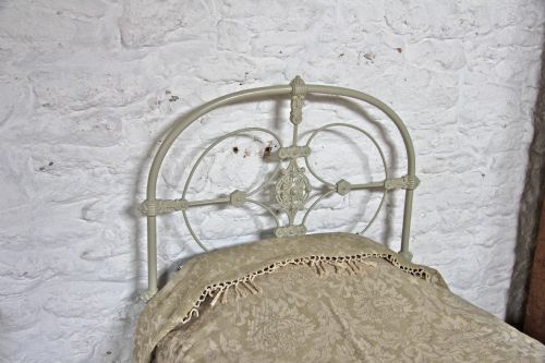 fig 1. Pretty no foot board single iron bed