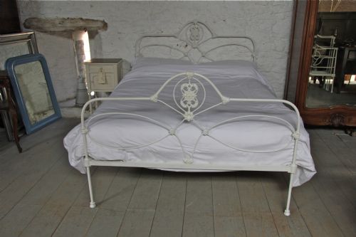 fig 1. Pretty early all iron king size aged white bed