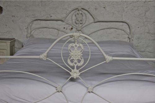 fig 2. Pretty early all iron king size aged white bed