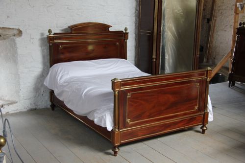 fig 3. Napoleon 11 mahogany with brass inlay double bed and armoire.