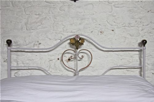 fig 1. Prettiest forged iron double bed