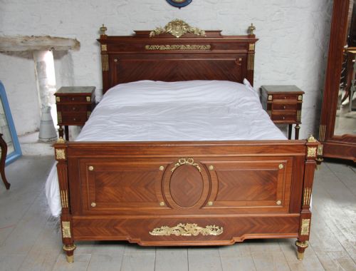 fig 2. Louis XV1 style bedroom suite with king size bed and armoire and pair of bedsides