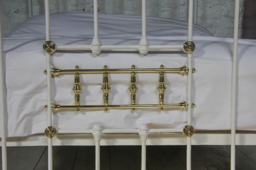 fig 2. Classic Victorian brass and white double bed with spindle detail