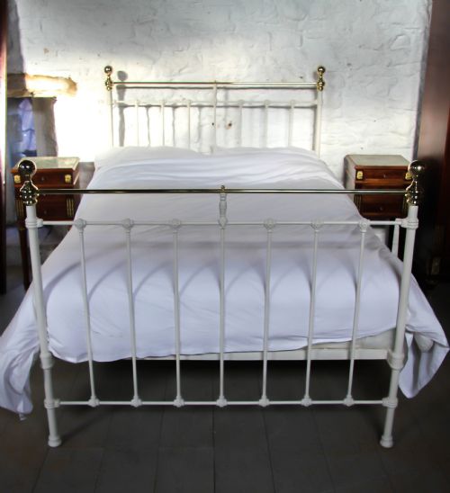fig 1. Classic Victorian white and brass double bed.