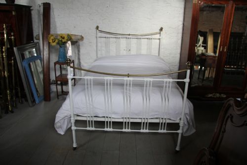 fig 2. Classic Edwardian white iron and brass dip rail bedstead
