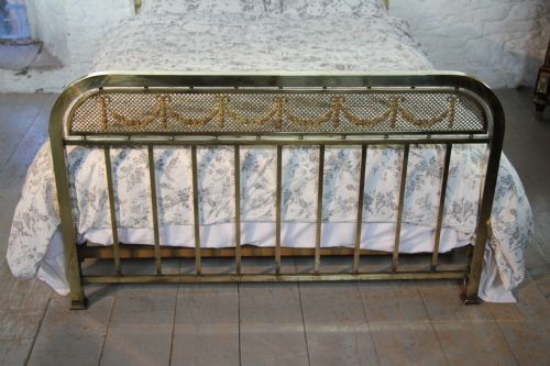 fig 2. IndividualFrench all brass bed with decorative garlands