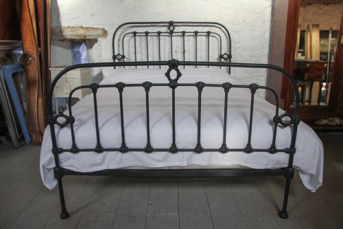 fig 1. Hand finished in black simple attractive all iron king size