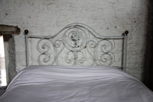 fig 1. Pretty Kingsize forged Iron and brass bed with no foot board