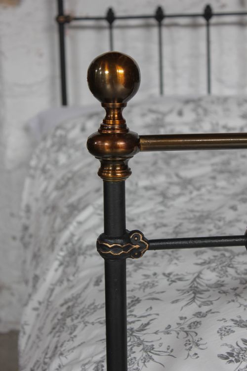 fig 1. Classic Victorian warm aged brass and black double bedstead