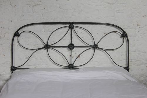 fig 1. Attractive hand finished king size Irish no end all iron bed.