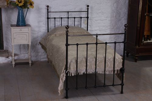 fig 1. Edwardian black and aged brass single bed