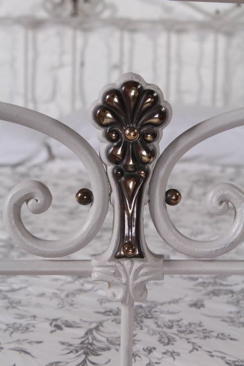 fig 2. Gorgeous French king size bed with brass detail