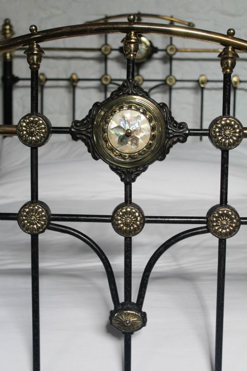 fig 2. All original classic Victorian bed with mother of pearl detail