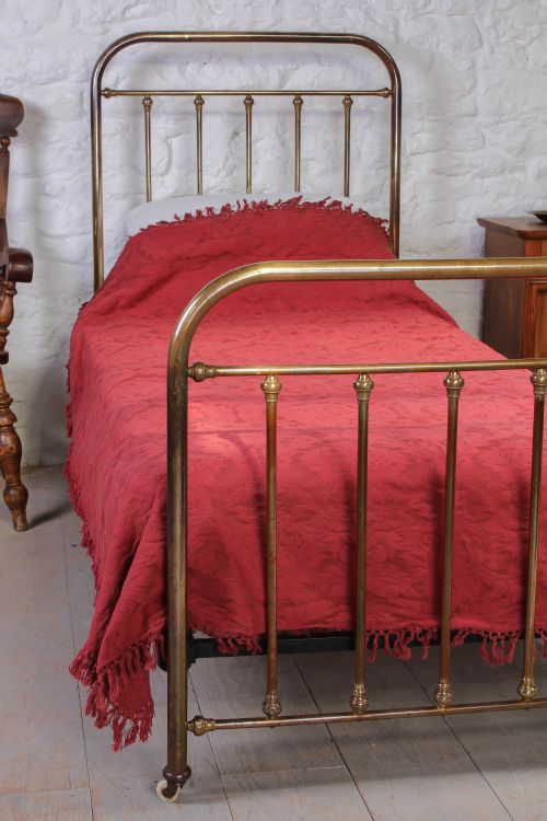 fig 1. French antique aged brass single bed with castors