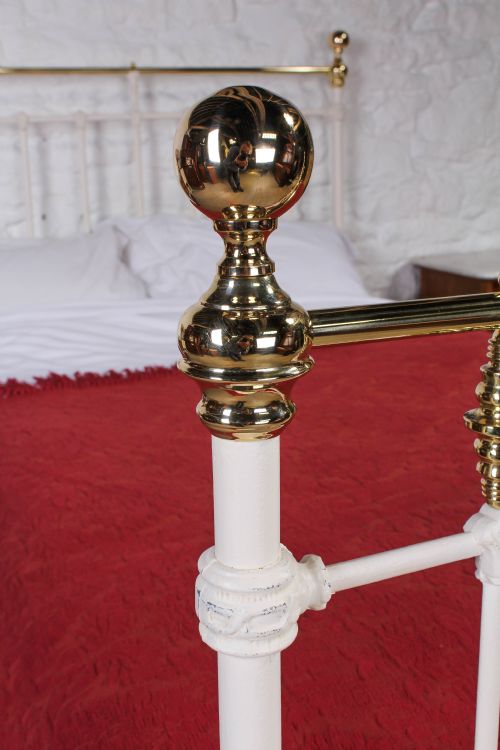 fig 1. Pretty three quarter white and brass bed