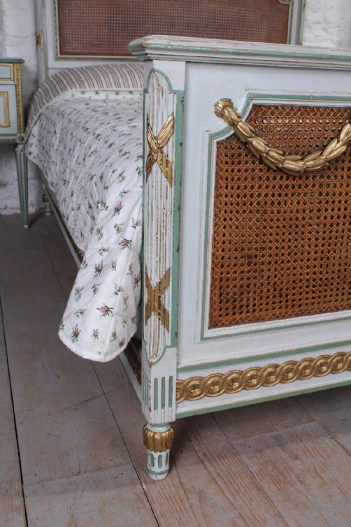 fig 3. Original painted decorative bergere caned bed and matching bedside