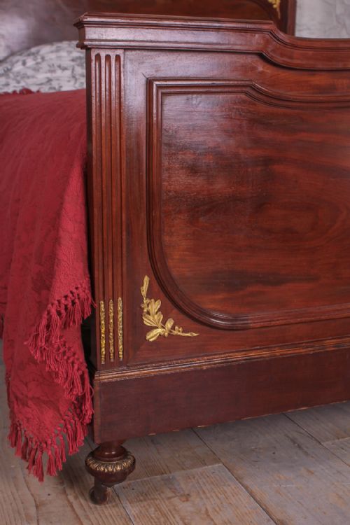 fig 3. Mahogany king size French bed with gilded bronze mounts