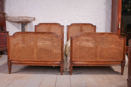 fig 1. Pair of French caned beregere single beds
