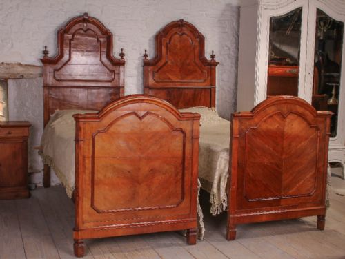 fig 1. Striking pair of joining Gothic cherry beds can join to make super king
