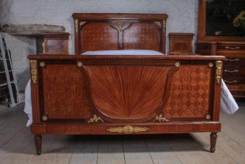 fig 1. Striking kingsize French fruit wood with bronze mounts bed