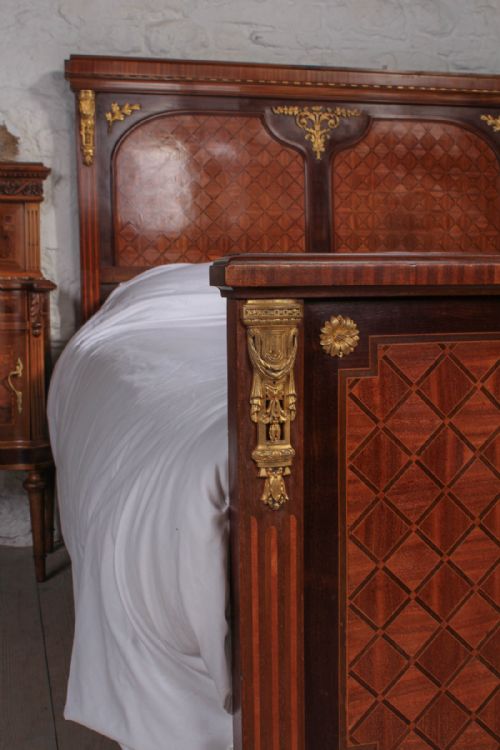 fig 2. Striking kingsize French fruit wood with bronze mounts bed