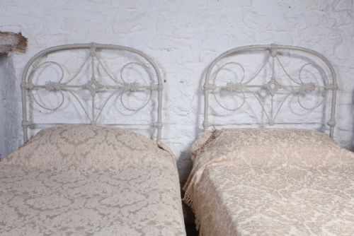 fig 2. Pretty pair of iron single no end beds