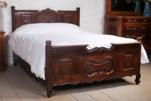 Lovely Solid Carved Dark Cherry Provencale King Size Bed with Shaped  Panels and Foliate Carving.