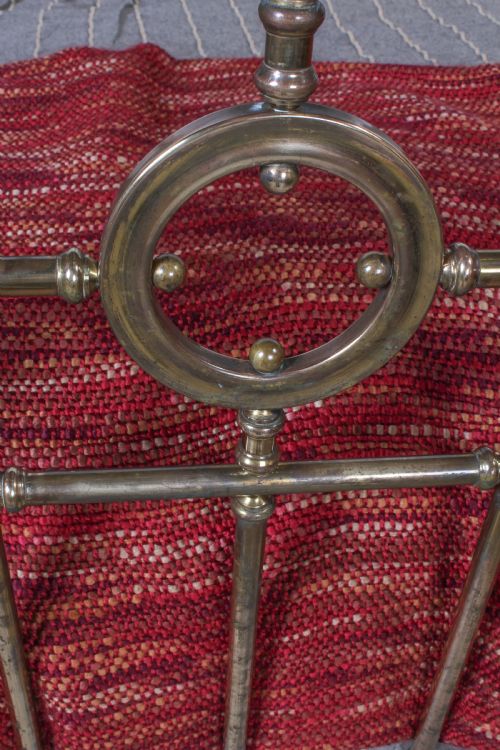 fig 1. Lovely naturally aged individual and simple brass French king size bed with brass ring detail