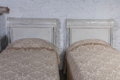 fig 1. Pair of Directoire style single low end beds