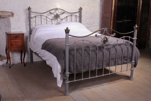 Classic Edwardian King Size Bed with Lovely Wavy Details

classic Edwardian King Size Brass and Iron Bed with Lovely Wavy Details