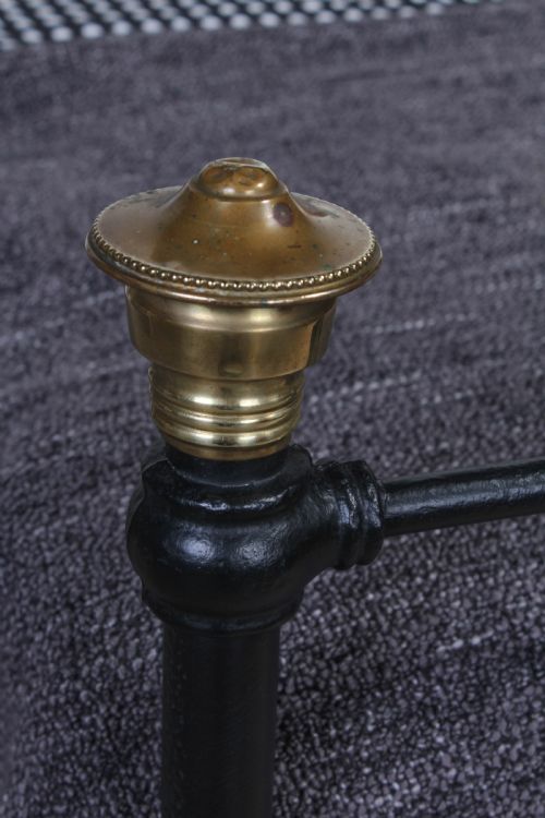 fig 1. Simple attractive Edwardian black and brass single bed