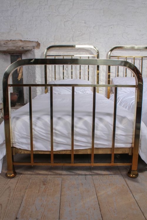 fig 1. Attractive pair of simple French all brass single beds